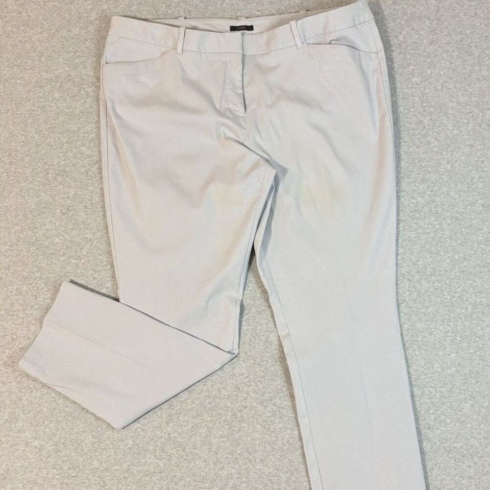 Worthington women’s Slim Fit dress pants in a light gray/silver color.